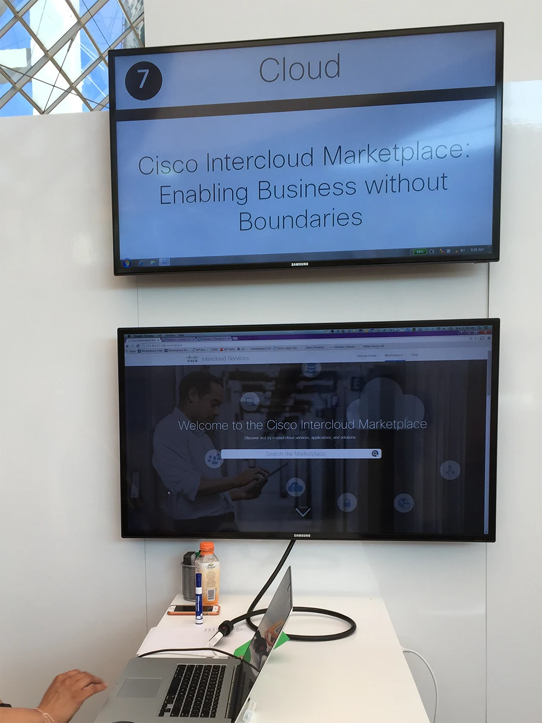 Two displays showing Cisco Intercloud Marketplace with the tagline “Enabling Business without Boundaries”