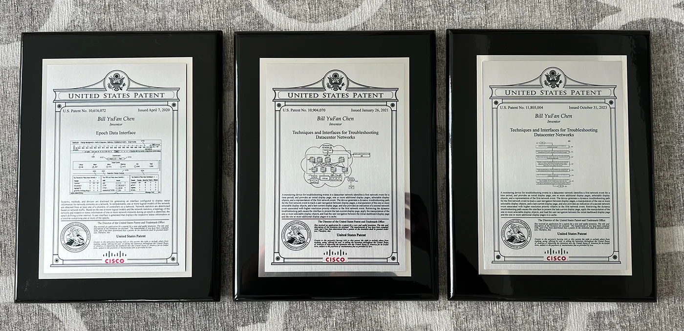 Three framed United States patent certificates naming Bill YuFan Chen as inventor